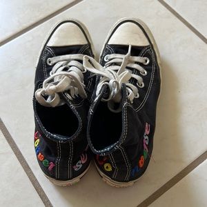 Black + rainbow Converse high tops